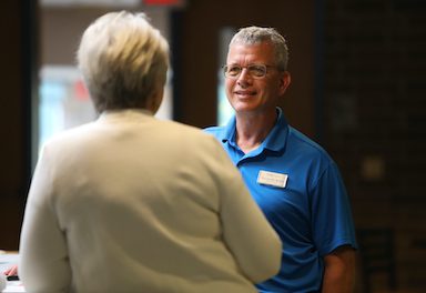 National Executive Director talking with local Executive Director